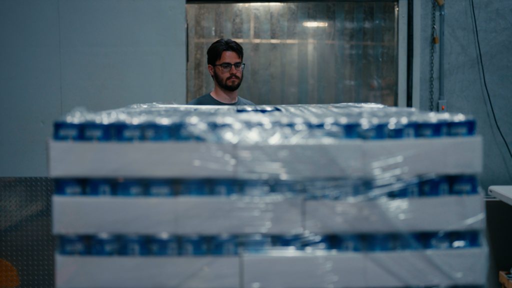 Man operating a pallet jack